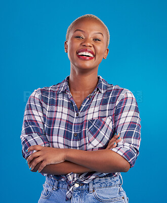 Buy stock photo Smile, crossed arms and portrait of black woman with happy mindset, proud and empowerment in studio. Fashion, beauty and attractive girl on blue background with wellness, happiness and motivation