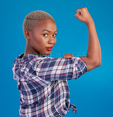 Buy stock photo Portrait, black woman and flex arms on blue background, studio and backdrop of freedom, empowerment or pride. Female model, bicep and girl power in fight of gender equality, strong muscle or feminism