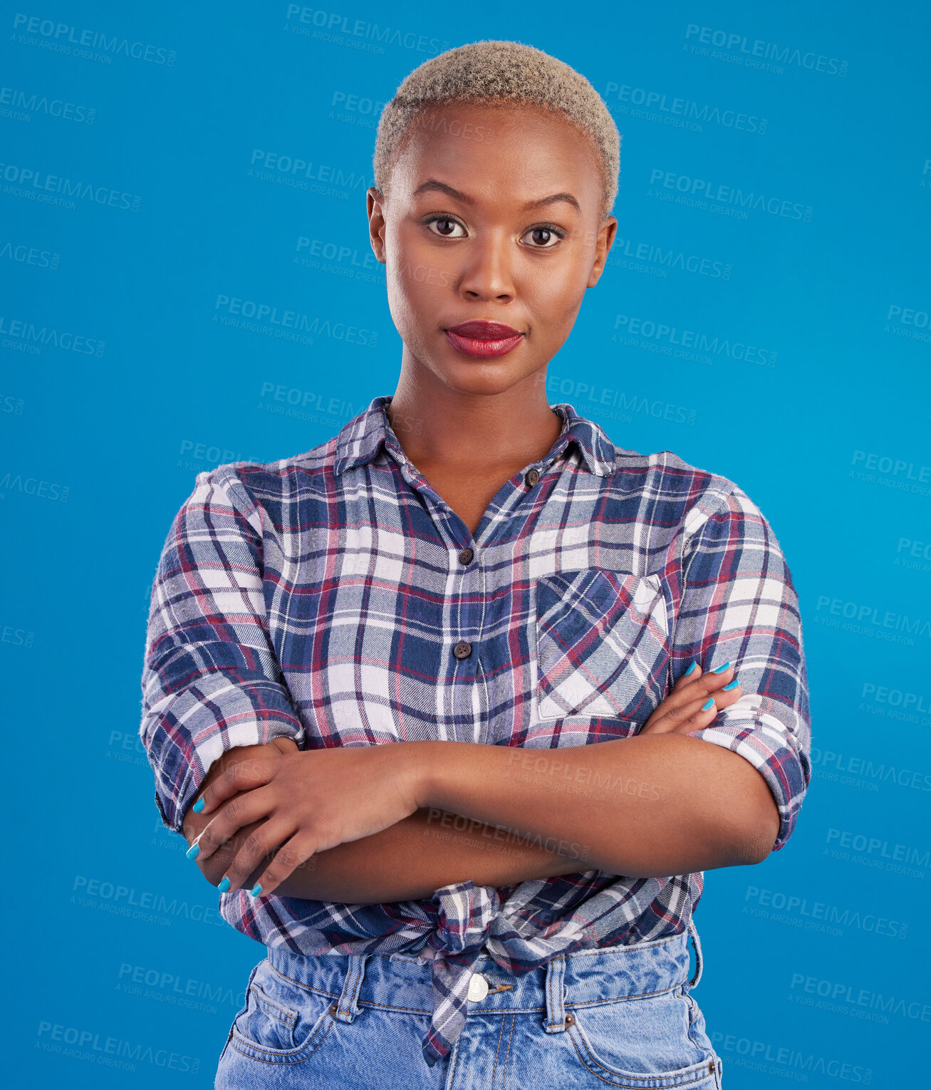 Buy stock photo Serious, confidence and portrait of black woman with crossed arms, proud and empowerment in studio. Fashion, beauty and attractive girl on blue background with pride, success mindset and motivation