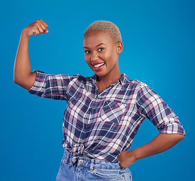 Buy stock photo Muscle, arm flex and portrait of black woman in studio for empowerment, confident and success. Achievement, hard work and pride with female isolated on blue background for power, strong or motivation