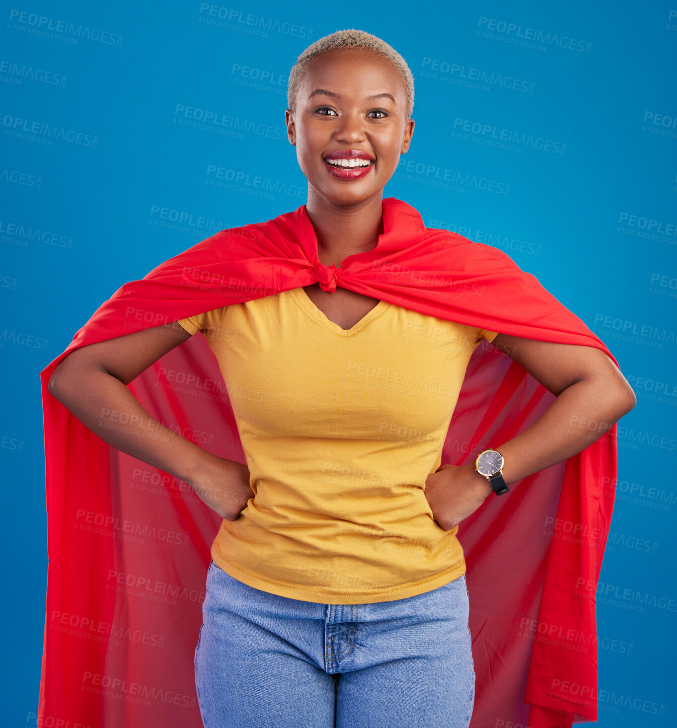 Buy stock photo Black woman, superhero cape and portrait in studio, blue background and fashion. Happy female model, superwoman and brave cosplay character of justice, smile and pride of girl power, proud and strong