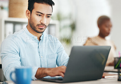 Buy stock photo Asian man, laptop and typing in startup office for planning, schedule or proposal in workplace. Web design expert, computer and focus at desktop for development, goals and seo strategy on internet