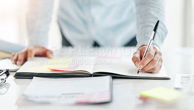 Buy stock photo Closeup, hands and notebook for planning, writing and calendar for schedule, deadline and new project. Zoom, hand or male employee with pen, journal or notes for ideas, proposal and review for report
