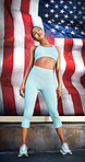 USA, fitness and woman training for sports, race or marathon for the country. Ready, standing and a runner with a flag for running, motivation to win and competition for sport, sprinting or cardio