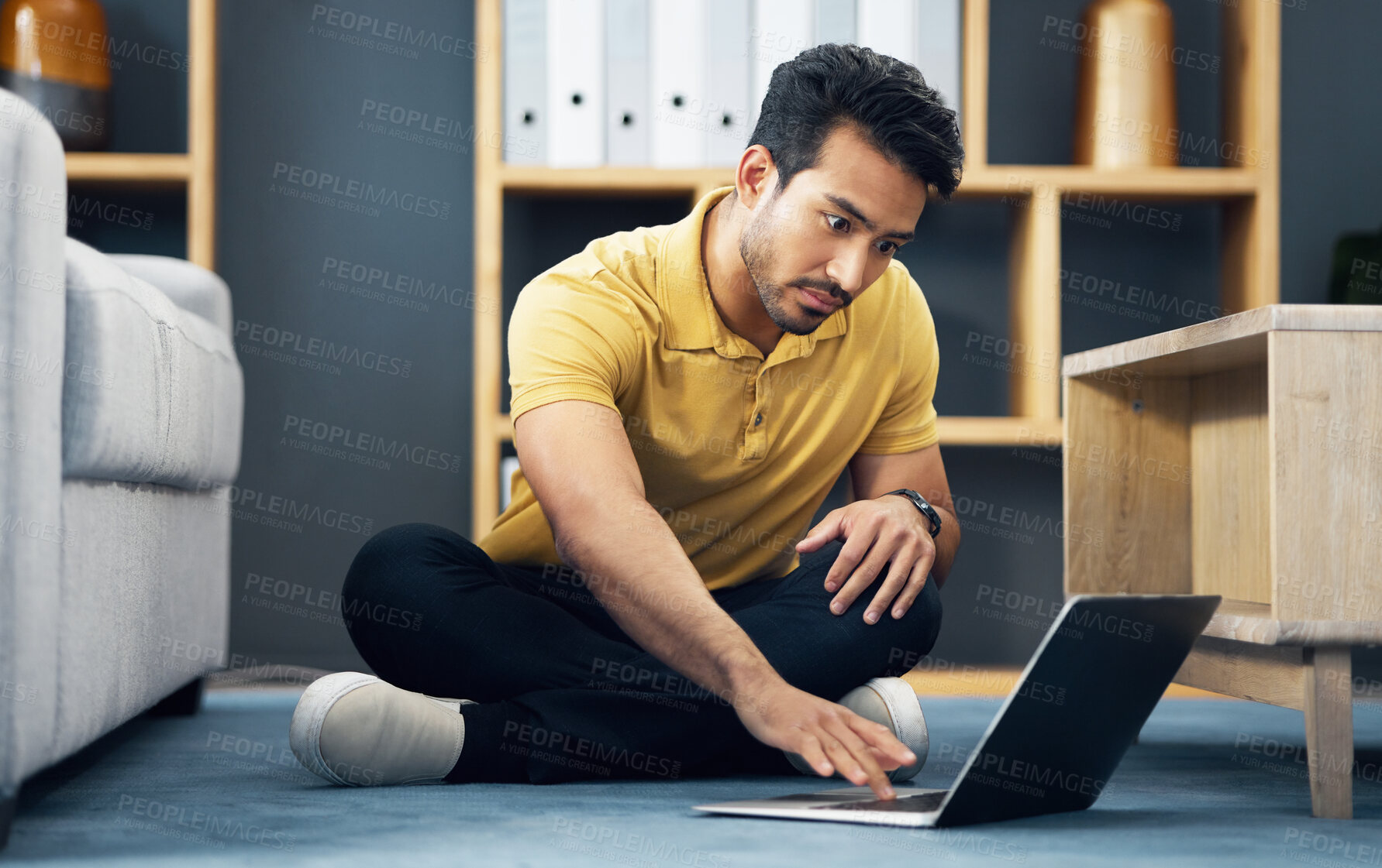 Buy stock photo Remote work, typing and an Asian man with a laptop on the floor for entrepreneurship and freelancing. Serious, contact and an entrepreneur working on a computer, reading communication and an email