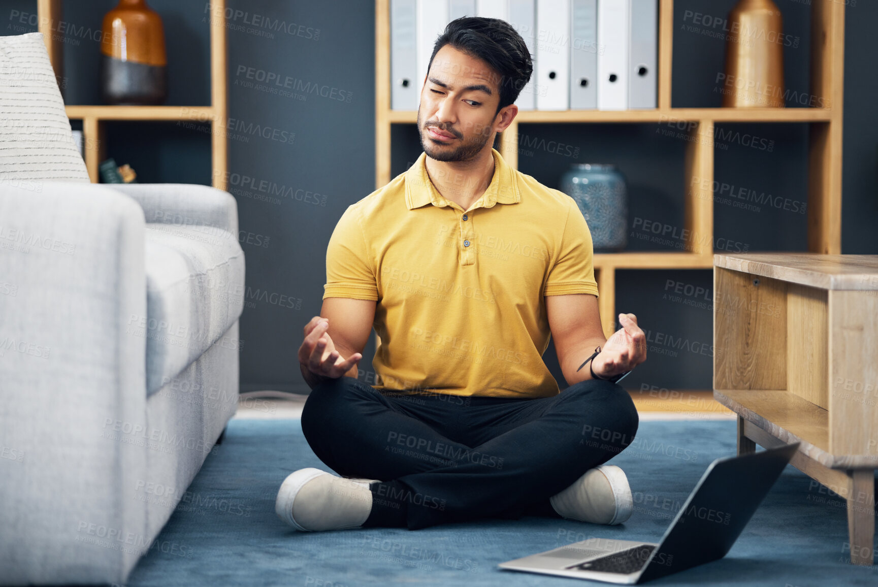 Buy stock photo Meditation, laptop and a yoga man with an online video for mental health, wellness or zen in his home. Fitness, internet and virtual class with a male yogi in the living room to meditate for peace