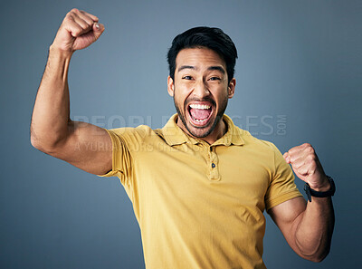 Buy stock photo Indian man, celebration fist and studio portrait for winning mindset, happiness or achievement by background. Young model, male student and celebration with happy, excited face or winning by backdrop