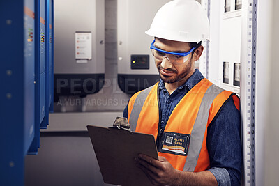 Buy stock photo Man, electricity and technician in control room, writing notes and machine maintenance on clipboard. Male electrician, system and electrical substation for power, engineering inspection and checklist