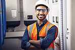 Portrait, happy man and engineering technician in control room, inspection service or industry maintenance. Electrician, arms crossed and smile in electrical substation, system or industrial mechanic