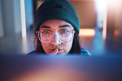 Buy stock photo Cybersecurity, ransomware and woman hacker working on a computer in the basement at night for phishing. Database, password and malware with a female coder hacking a digital transformation network