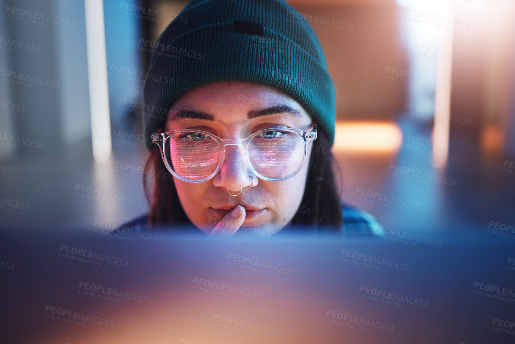 Buy stock photo Cybersecurity, ransomware and woman hacker working on a computer in the basement at night for phishing. Database, password and malware with a female coder hacking a digital transformation network