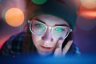 Buy stock photo Coding, face and serious woman working overtime at night programming a computer, website or app development. Focus. workaholic and young female student or web design freelancer with a deadline