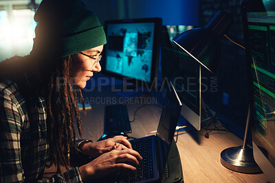 Buy stock photo Woman, laptop and hacker typing in home with software, data programming or cybersecurity. Developer, it coder and female focus on hacking, phishing or malware code on computer for dark web at night.