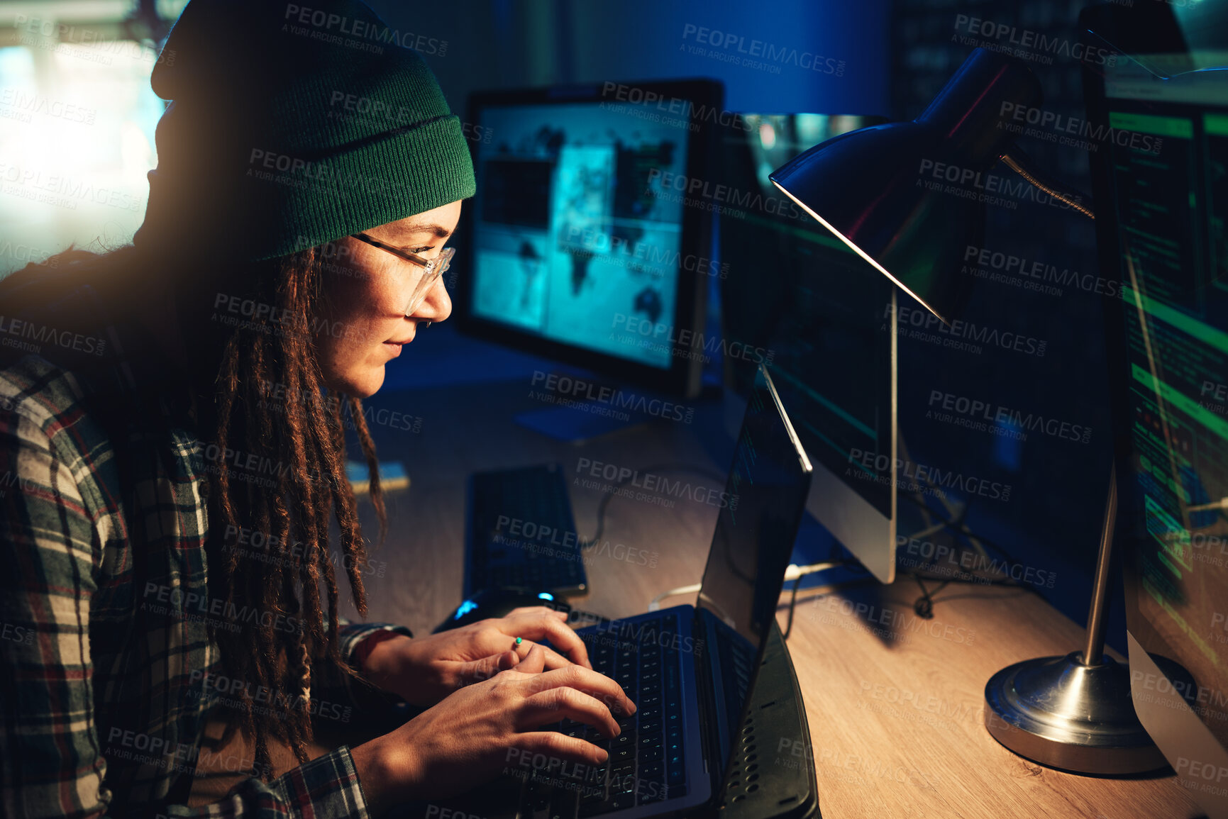 Buy stock photo Woman, laptop and hacker typing in home with software, data programming or cybersecurity. Developer, it coder and female focus on hacking, phishing or malware code on computer for dark web at night.