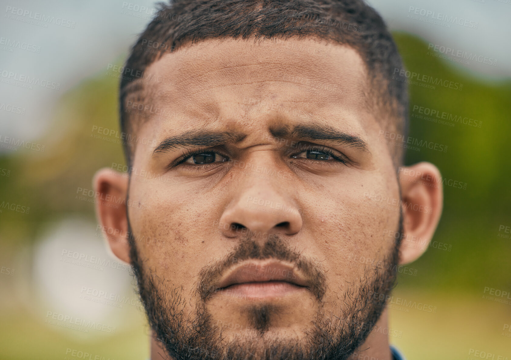 Buy stock photo Rugby, focus and portrait of man with serious expression, confidence and pride in winning game. Fitness, sports and zoom on face of player ready for match, workout or competition on grass at stadium.