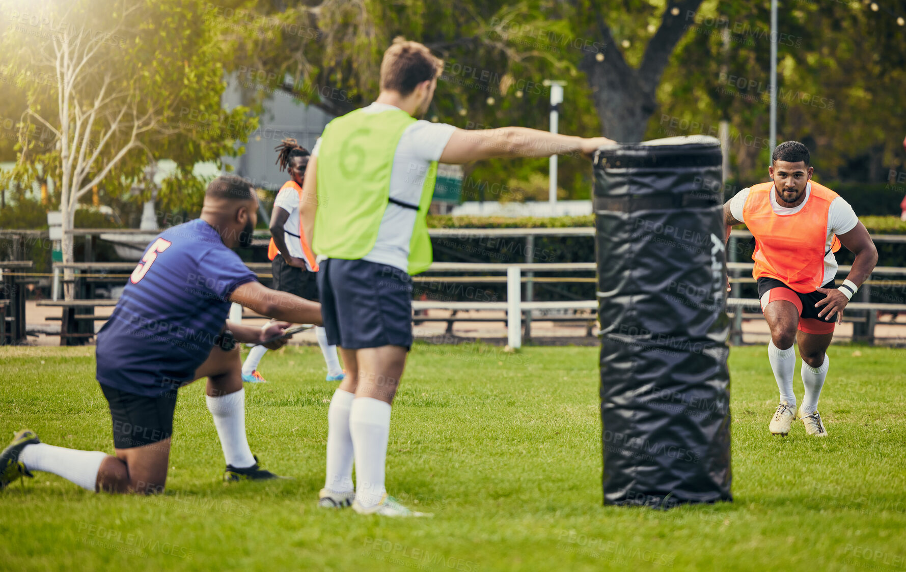 Buy stock photo Rugby, teamwork and men training on field with equipment ready for match, practice and sports game. Fitness, performance and male athletes running for warm up, exercise and workout for competition