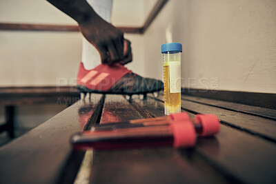 Buy stock photo Rugby, blood and urine sample in a locker room for sports regulations or anti doping testing. Fitness, health and medical with an athlete getting ready after a drug test for an illegal substance
