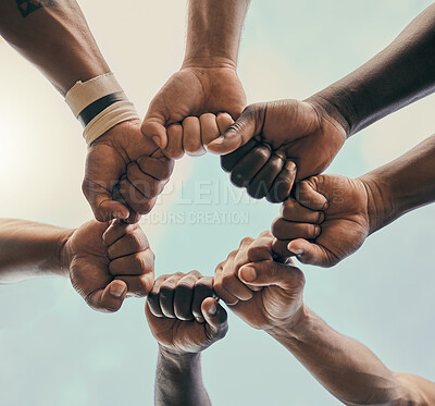 Buy stock photo Hands, fist and unity with a sports team standing in a huddle for solidarity or motivation before a game. Fitness, teamwork and diversity with a group of men in a circle, getting ready for a match