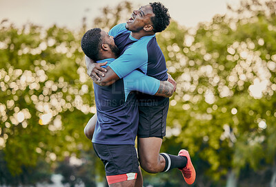 Buy stock photo Rugby men, hug and celebration at game for winning, teamwork and success on field for sports. Team building, jumping and support for sport friends, goals and winner to celebrate achievement together