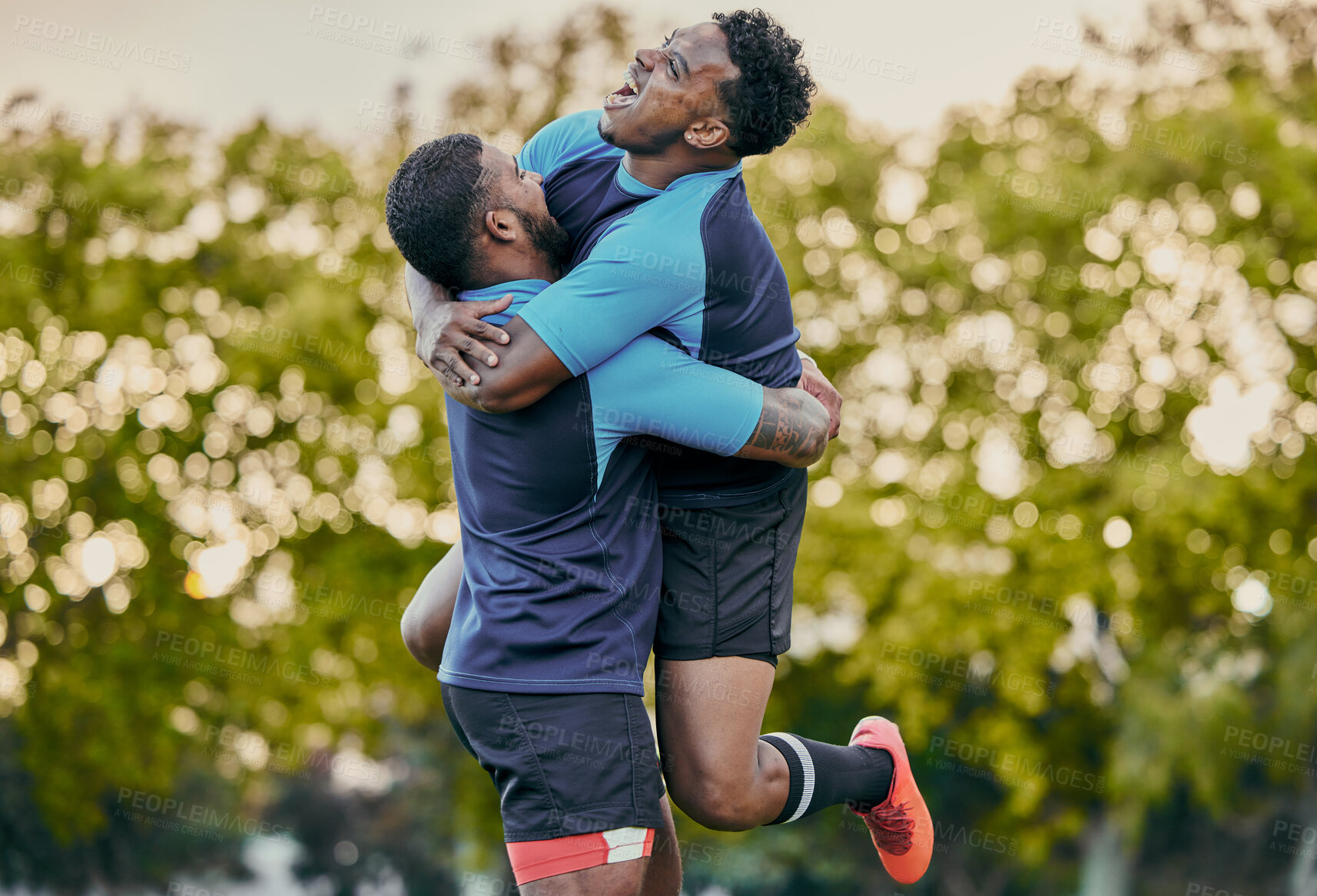 Buy stock photo Rugby men, hug and celebration at game for winning, teamwork and success on field for sports. Team building, jumping and support for sport friends, goals and winner to celebrate achievement together