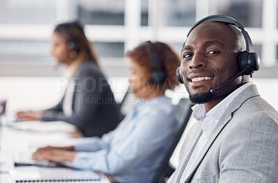Buy stock photo Portrait, telemarketing and black man with team, call center and customer service in workplace. Face, African American male employee or happy consultant in office, headset and tech support in office 