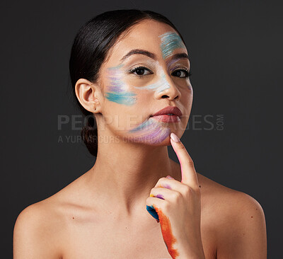 Buy stock photo Skin, art and portrait of woman with face paint, creative makeup and self expression. Beauty, creativity and color in artistic cosmetics, empowerment and freedom to express for young beautiful girl.