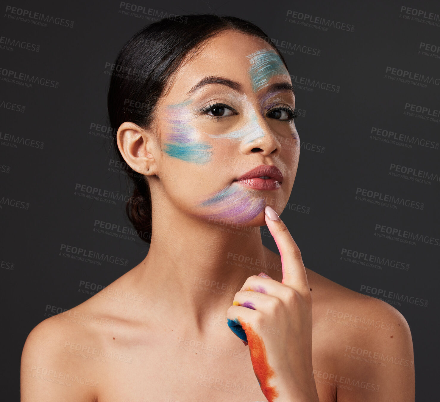 Buy stock photo Skin, art and portrait of woman with face paint, creative makeup and self expression. Beauty, creativity and color in artistic cosmetics, empowerment and freedom to express for young beautiful girl.