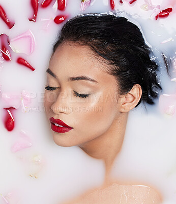 Buy stock photo Rose milk bath, natural beauty and red lipstick of an Asian woman with makeup and cosmetics. Above, skincare and wellness of a female model with dermatology, flower aromatherapy and spa treatment
