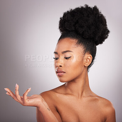 Buy stock photo Beauty, skincare and hand of black woman with product placement for cosmetics on white background. Studio, mockup and makeup presentation, African model with glowing skin and spa or salon treatment.