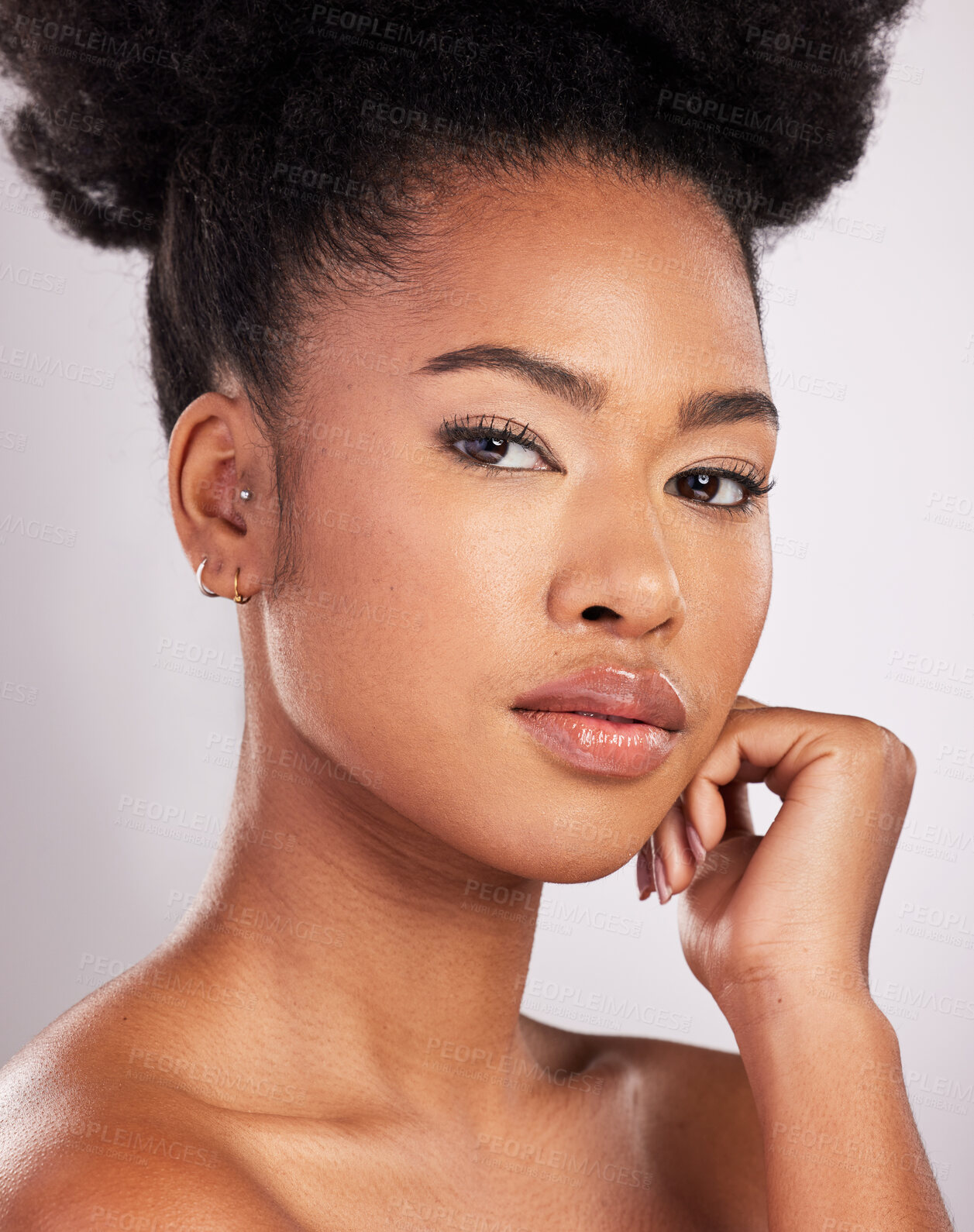 Buy stock photo Skincare, beauty and portrait black woman with serious face, white background and cosmetics product. Health, dermatology and natural makeup, African model in studio for healthy skin care and wellness