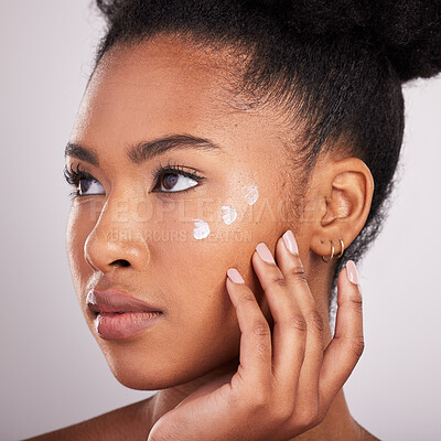 Buy stock photo Skincare, beauty and black woman with cream on face for anti aging or fresh skin glow on white background. Cosmetics, facial and lotion, African model with moisturizer or cleansing product in studio.