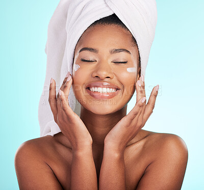 Buy stock photo Skincare, beauty and lotion, black woman with smile on face for anti aging or skin glow on blue background. Cosmetics, facial and cream, African model with moisturizer or cleansing product in studio.