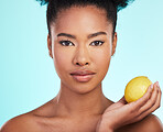 Lemon, skincare and portrait of serious black woman in studio for wellness, natural cosmetics and facial. Dermatology spa, beauty and face of girl with citrus fruit for detox, vitamin c and nutrition