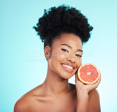 Buy stock photo Grapefruit, skincare smile and woman portrait of beauty, wellness and detox healthcare. Isolated, blue background and studio with a female feeling happy from healthy fruit with vitamin c for glow