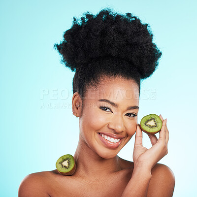 Buy stock photo Kiwi fruit, skincare and woman portrait of beauty, wellness and detox healthcare. Isolated, blue background and studio with a young female feeling happy from healthy food with vitamin c for glow