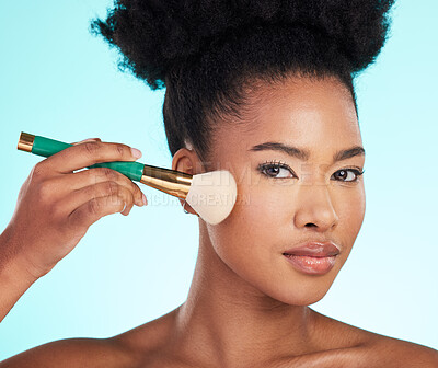 Buy stock photo Makeup, brush and portrait of black woman for beauty, cosmetics and glamour on blue background. Salon, cosmetology and face of girl with brushes for foundation, skincare and application in studio