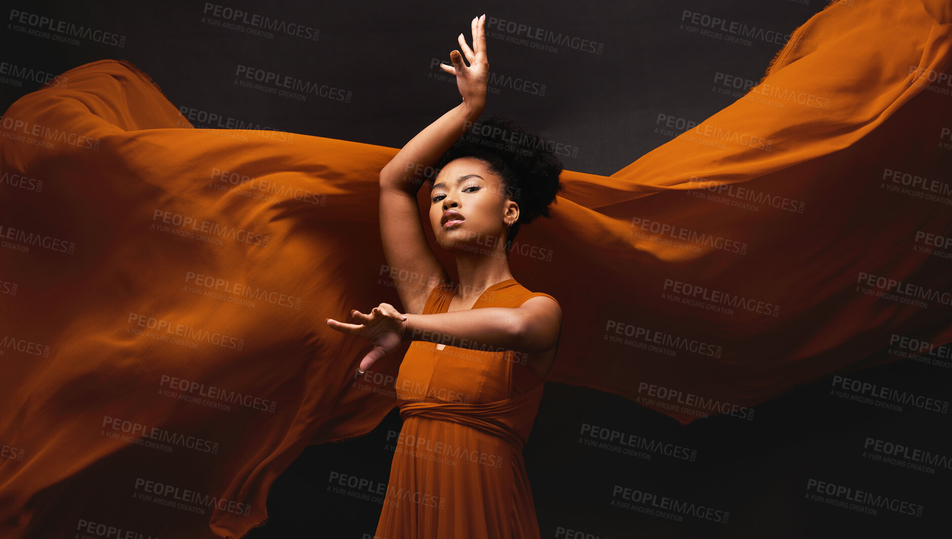 Buy stock photo Black woman, art and fashion, fabric on dark background with dance and aesthetic movement. Flowing silk, fantasy and artistic portrait of serious African model in creative designer dress in studio.