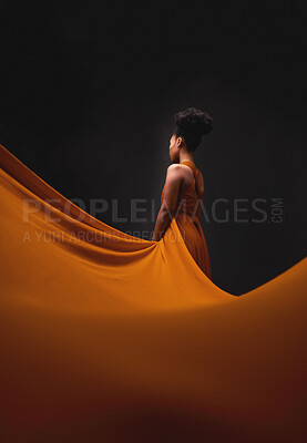 Buy stock photo Black woman, art and fashion, fabric with mockup on dark background with beauty and aesthetic movement. Flowing silk, fantasy and artistic African model in creative designer dress in studio from back