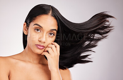 Buy stock photo Hair flip, portrait and beauty of a woman in a isolated, white background and studio with salon treatment. Cosmetics, self care glow and young female model with healthy hairstyle texture and haircut 