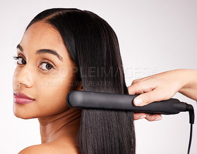 Buy stock photo Woman flat iron and studio portrait with hair care, wellness and heat treatment by white background. Girl, model and healthy glow at hairdresser with electric tools for cosmetics, change and beauty