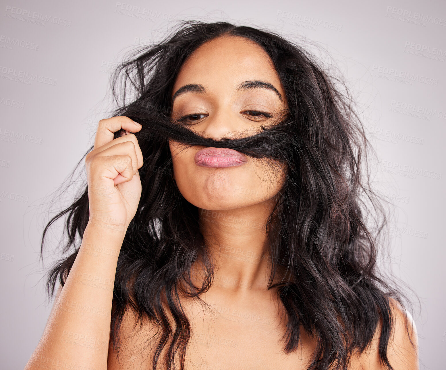 Buy stock photo Beauty, salon and woman smell hair, aesthetic and cosmetics on a grey studio background. Female, moustache and lady with facial expression, silly and goofy with treatment, smelling clean and wellness