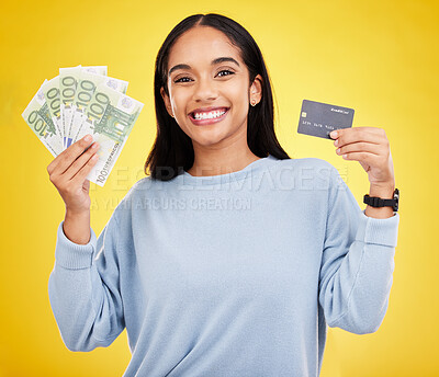 Buy stock photo Woman, portrait smile and credit card with money for ecommerce, shopping or banking against a yellow studio background. Happy female shopper smiling and holding cash and debit from bank withdrawal
