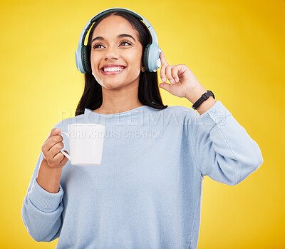 Buy stock photo Coffee, music and headphones with woman in studio for streaming, online radio and relax. Smile, media and podcast with female isolated on yellow background for technology, listening and connection