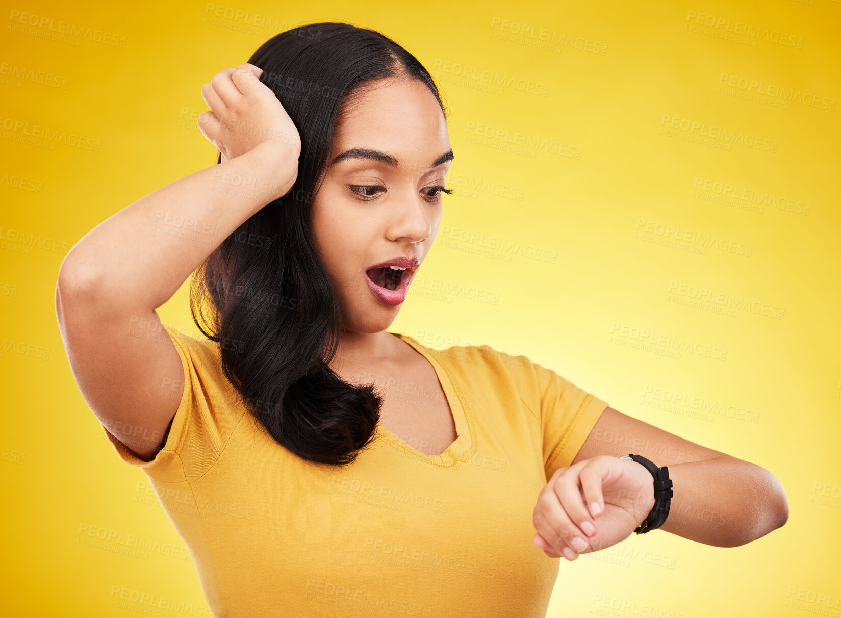 Buy stock photo Late, watch and surprise of a woman in a studio looking at time with alarm feeling shocked. Isolated, yellow background and young female model with shock from watching the clock and smartwatch