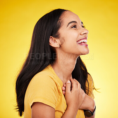 Buy stock photo Woman laugh, profile and studio with a excited young model happy with casual fashion. Isolated, yellow background and gen z, student and female person with a smile feeling happiness and surprise