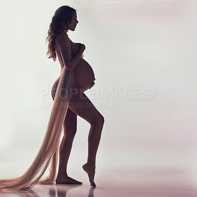 Buy stock photo Woman, pregnant and fabric with silhouette in studio with hands, touch and healthy by white background. Pregnancy model, shadow art or wellness mockup with cloth, body and stomach with dark aesthetic