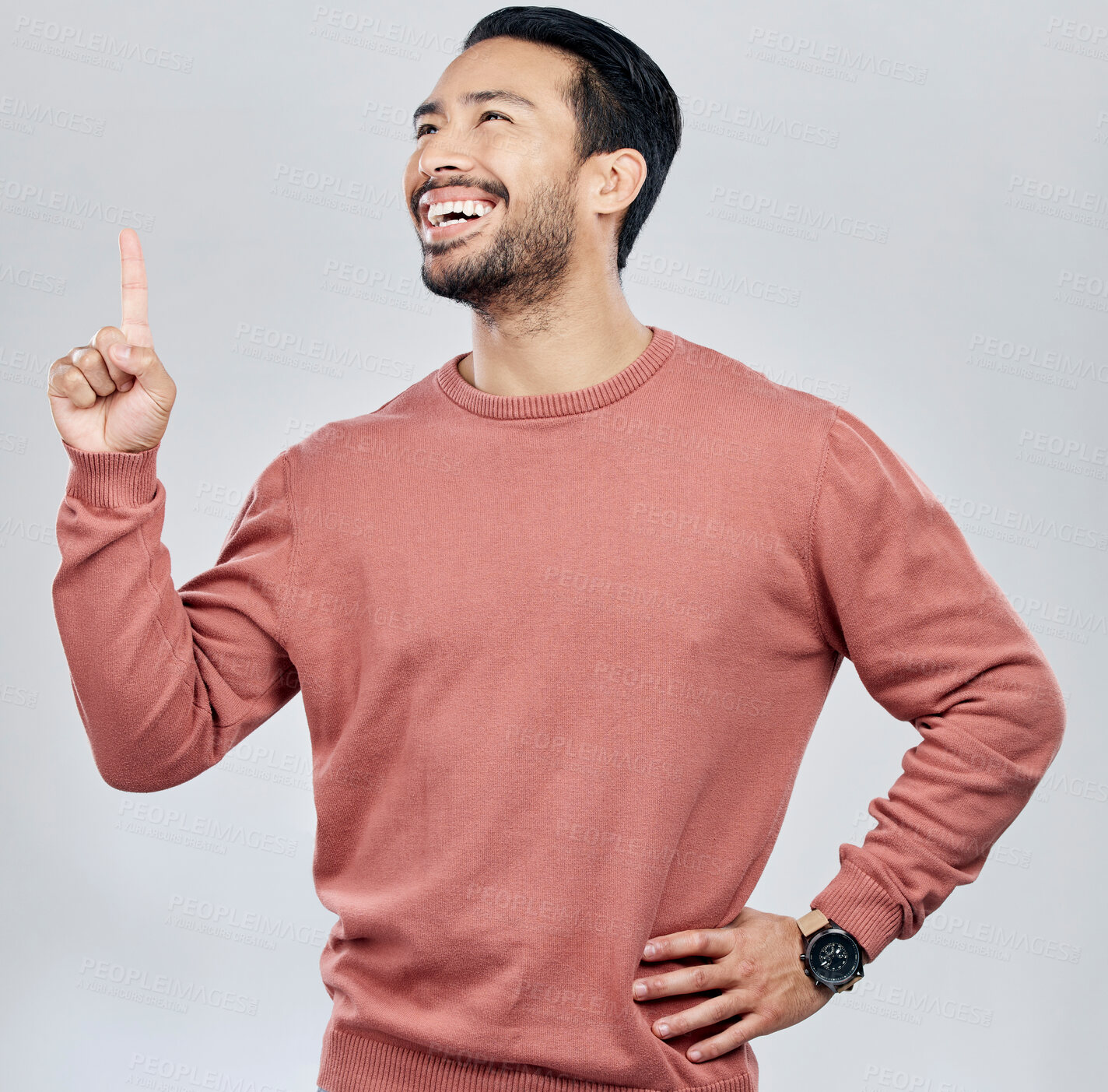 Buy stock photo Happy, smile and pointing with man in studio for idea, product placement and announcement. Success, confident and direction with male isolated on white background for positive, advertisement or pride