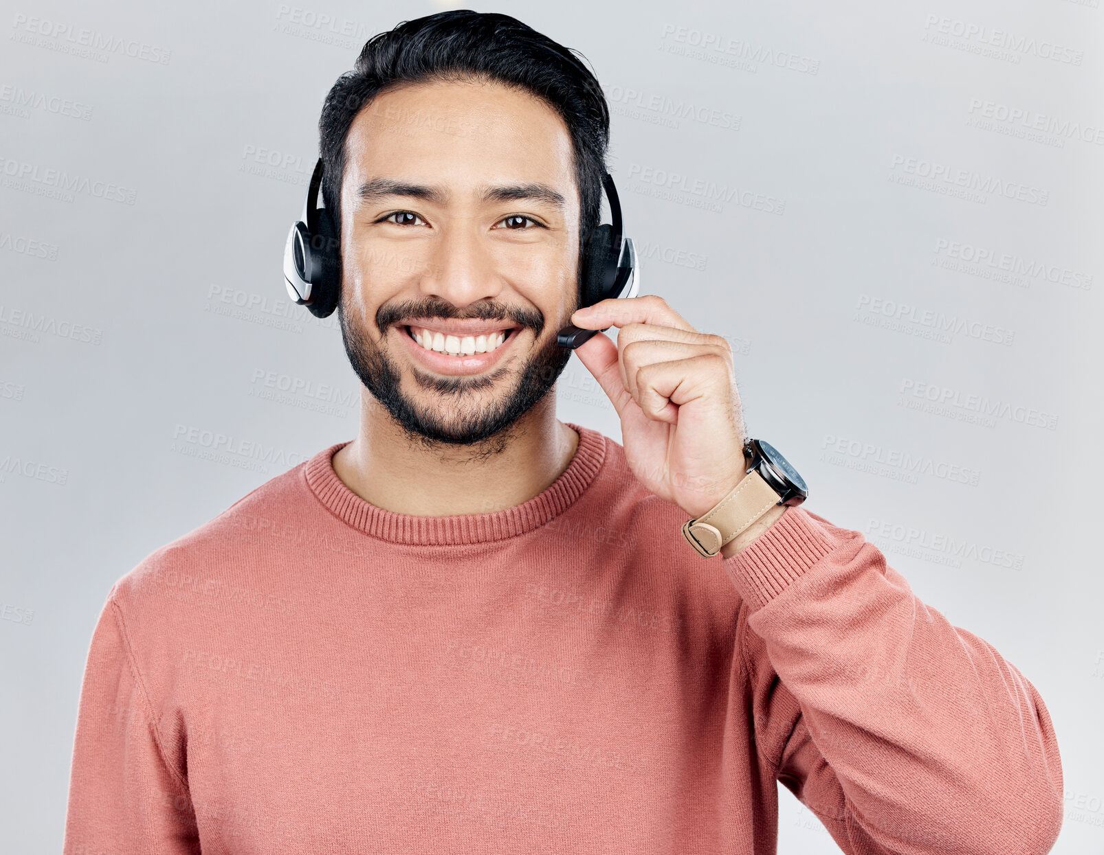 Buy stock photo Asian man, portrait smile and headphones with mic for call center or online customer service against a white studio background. Happy male consultant with headset smiling for wireless communication