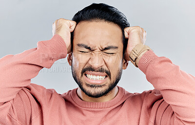 Buy stock photo Man, face and frustrated with stress headache, anxiety and mental health isolated on studio background. Male with eyes closed, depression and distress, person in pain with migraine and burnout 