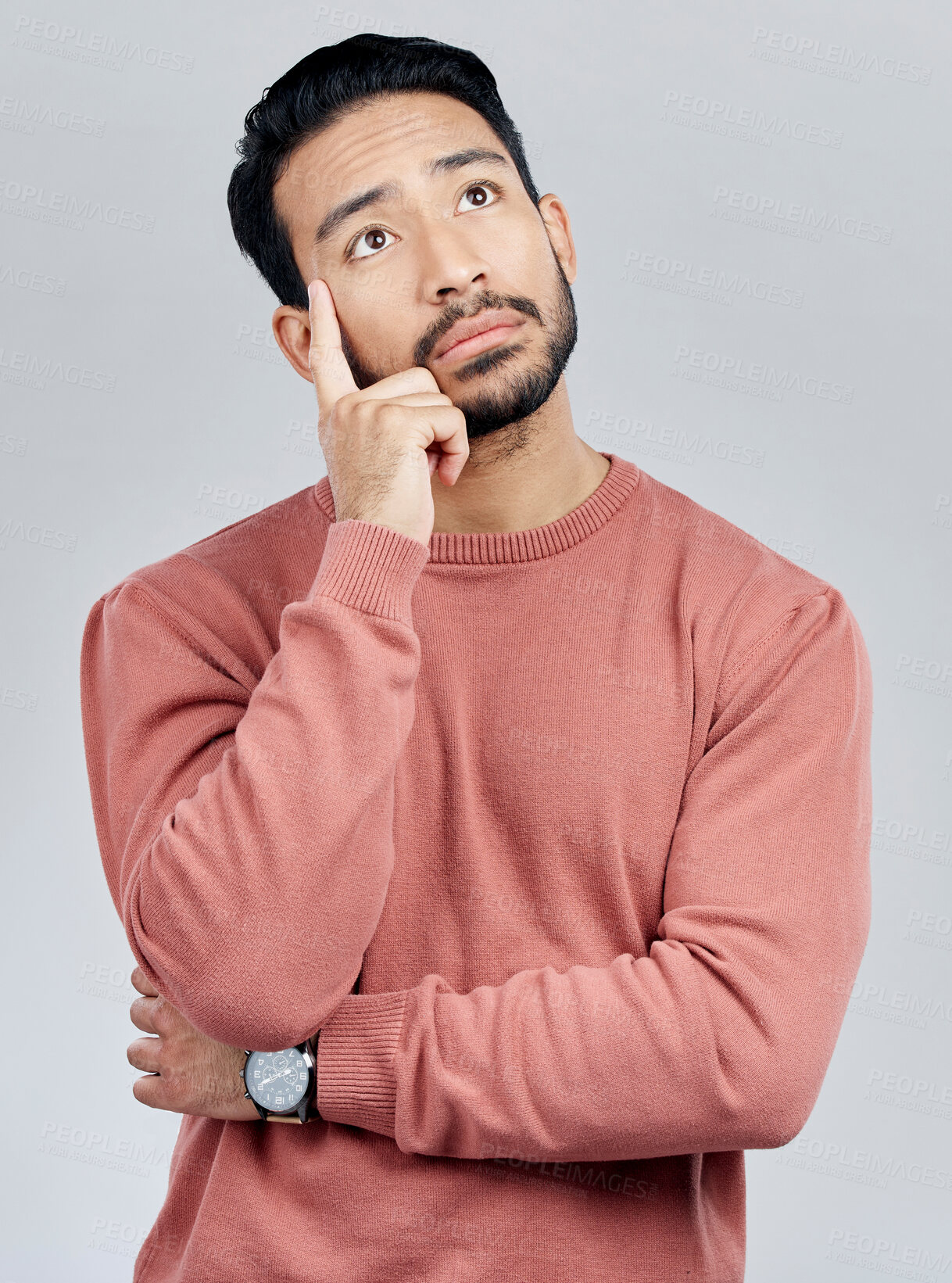 Buy stock photo Thinking, confused and question with a man in studio on a gray background looking thoughtful or contemplative. Doubt, idea and memory with a young asian male trying to remember but feeling unsure